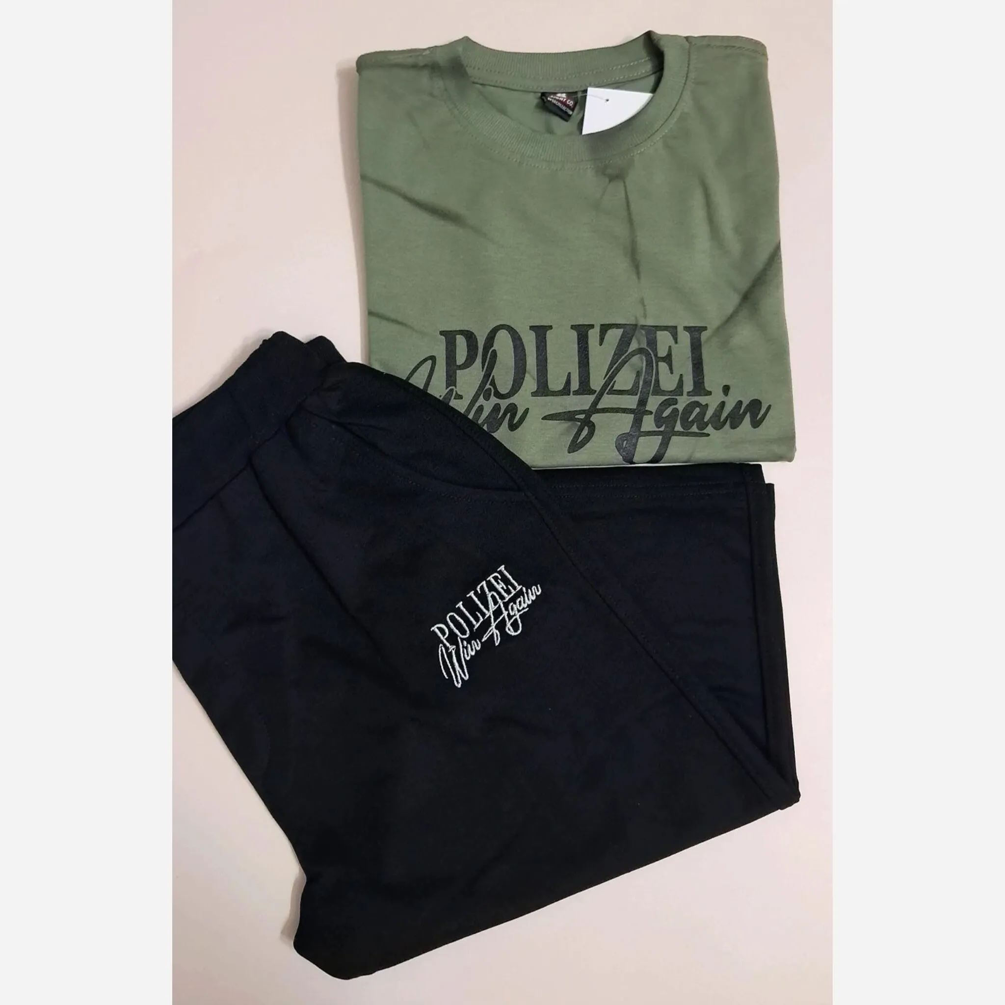 ست تیشرت پنبه یک رو و شلوارک دورس پسرانه طرح polizei رنگ آبی و سبز سایز 65 و 70